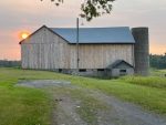 Exterior after gable end and straw barn